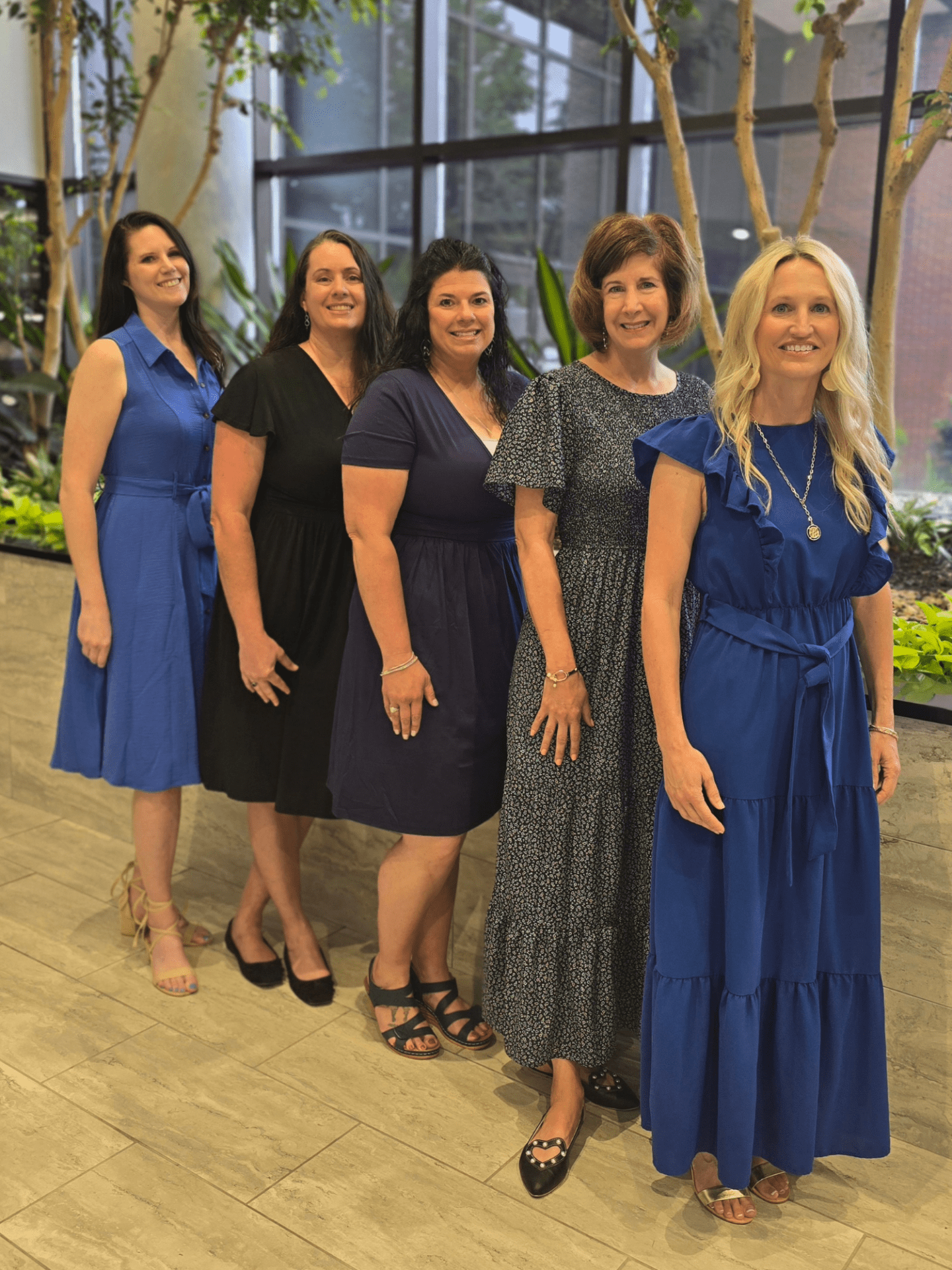 STL Portrait St. Louis Regional Office client support team